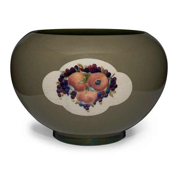 William Moorcroft (1872-1945) Pomegranate and Leaf and: William Moorcroft (1872-1945), Pomegranate and Leaf and Fruit jardiniere, England, polychrome glazed ceramic, painted signature, impressed marks, 12"w x 8.5"h