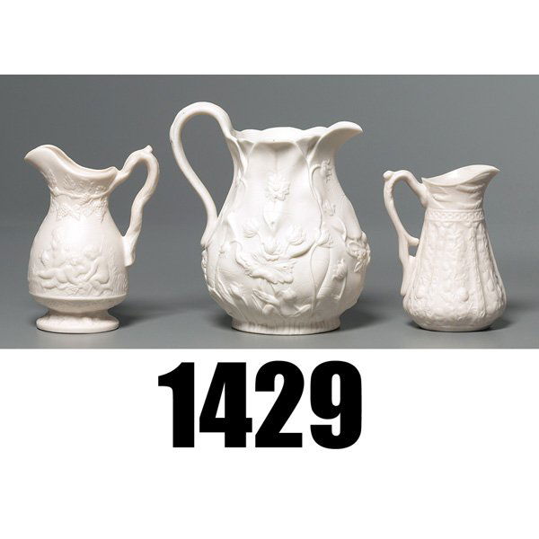 Parian Ware handled vessel, w/Parian Ware handled: Parian Ware handled vessel, unglazed with a relief, marked HHH diagonally, 5.5"h; with a Parian Ware handled vessel, floral decoration, impressed numbers 332 and 12, 6.5"h; with a Parian Ware handled