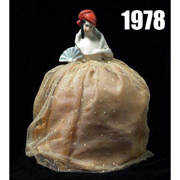 German half doll, porcelain woman: German half doll, porcelain woman with red hat and decorative fan, marked Germany, 4"h