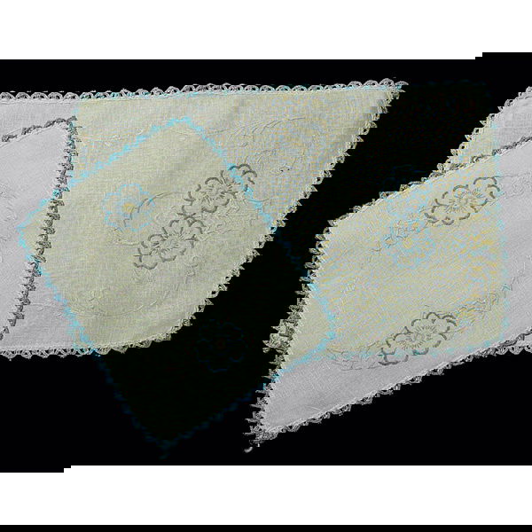 Arts & Crafts linens, seven pieces: Arts & Crafts linens, seven pieces, table runners (3), table mats (2) (examples shown), embroidered basket of flowers design, largest is 39"l; with (not shown): table mat, floral design, 10.5"l; laund