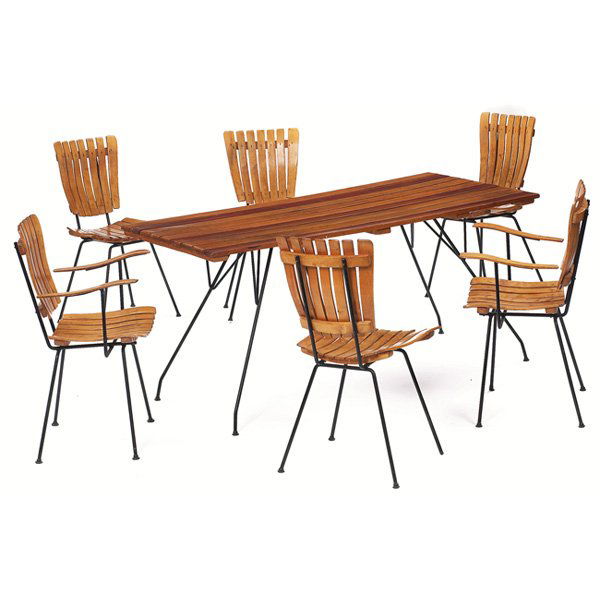 Arthur Umanoff dining table and chairs,: Arthur Umanoff dining table and chairs, by Raymor, USA, two armchairs and four side chairs, chair seats and table top of birch, black wrought-iron frames, table: 60"w x 30"d x 28.5"h, chairs: 18"w x 1