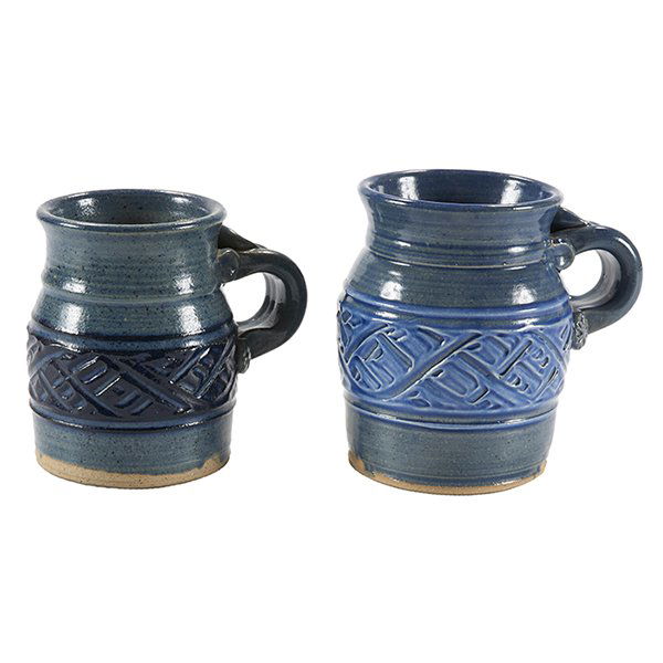 Don Reitz (American, 1929-2014), Untitled, (two mugs),: Don Reitz (American, 1929-2014), Untitled, (two mugs), ceramic, signed, largest: 4.25"h x 4.5"w x 3.5"d,