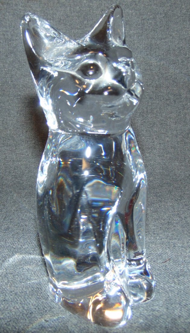 Daum French Clear Crystal Seated Cat: Daum French Clear Crystal Seated Cat. Measures 6-3/4" tall. Condition is Mint. No Damage. Starting Bid $50. Auction Estimate $80 - $150.