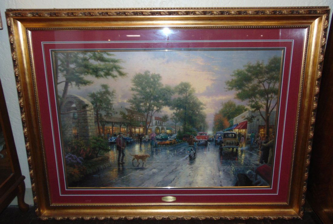Thomas Kinkade "Carmel, Sunset on Ocean Avenue" 1999: Thomas Kinkade "Carmel, Sunset on Ocean Avenue". Issued 1999. Beautifully Framed and Matted under glass. Frame measures 42-1/2" tall x 56-1/2" wide. Condition is very good. No Damage. Starting Bid $50