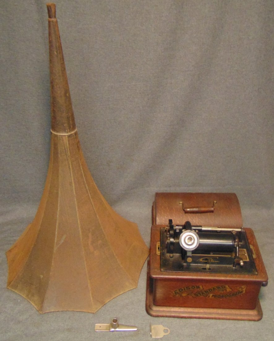Model A. Edison Cylinder Phonograph & Horn: Model A. Edison Cylinder Phonograph & Horn. Original Oak Case. Very Collectible. Does not appear to be working. Horn has losses to finish. Sold as is. Starting Bid $50.