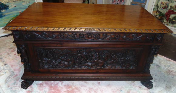 Antique Italian Renaissance Carved Walnut Desk: Magnificent Antique Italian Renaissance Carved Walnut Desk. Circa 1900. Deep, High Quality Carving. Ancient Roman Scenes. Measures 68" wide x 38" deep x 33" tall. Condition is very good with minimal w