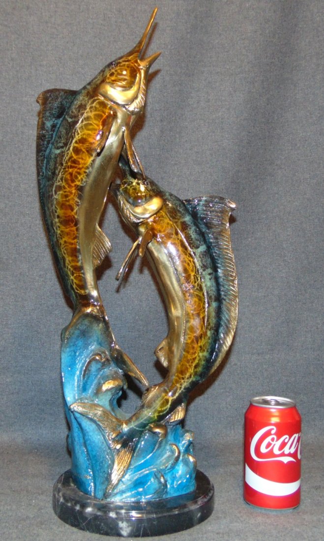 Bronze 2 Marlins Sculpture on a Marble Base: Bronze 2 Marlins Sculpture on a Marble Base. Multi color Cold Painted Bronze. 2 Marlins breaching the water. Measures 23" tall. Condition is New, Mint. No Damage. This Sculpture is made entirely from 