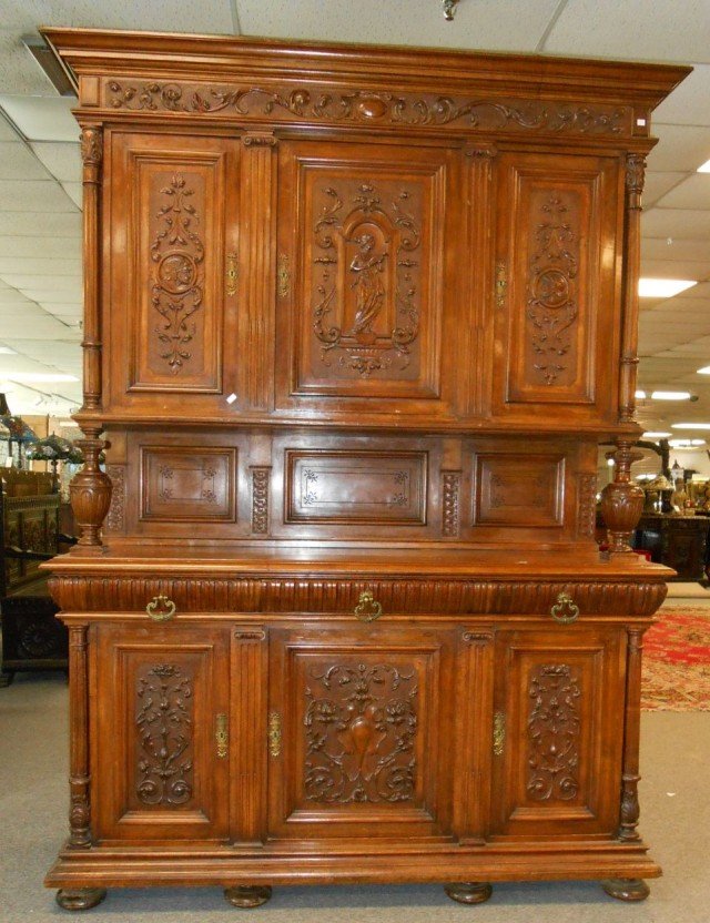 Italian Renaissance Style Carved Walnut Sideboard: Beautiful and Monumental Italian Renaissance Style Carved Walnut Sideboard. Circa 1880's. High Quality carving. Original Finish. Loads of storage. Stands 97" tall x 70" wide x 24" deep. Very high qual