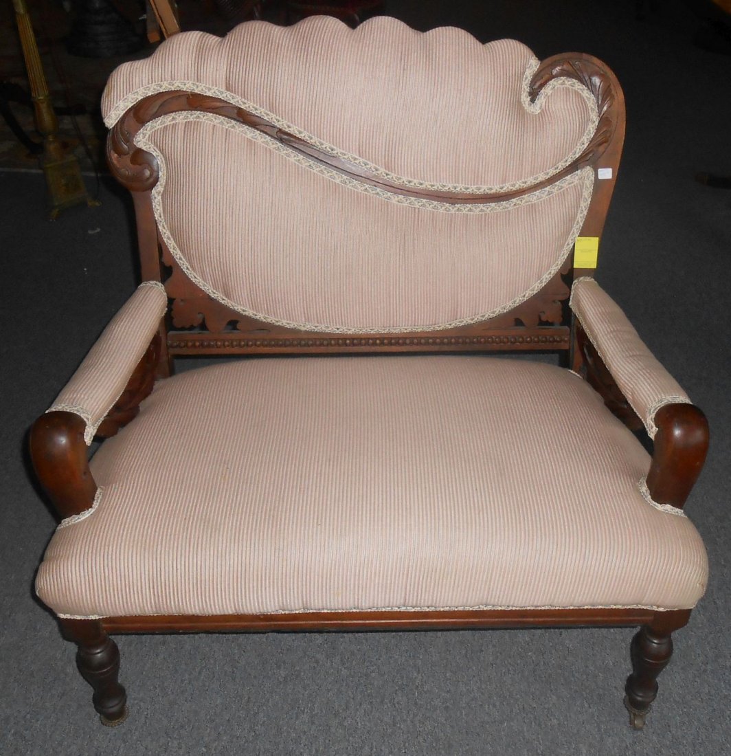 Antique Carved Walnut Settee: Antique Victorian Carved Walnut Settee. Rather Petite. Measures 35" wide x 27" deep x 35" tall. Condition is good with some wear and scratches typical from age. Starting Bid $30.