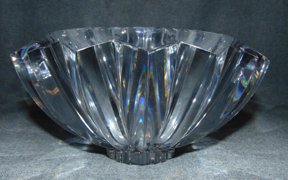 Large Orrefors "Zodiac" Crystal Bowl: Large Orrefors Swedish Crystal Bowl in the "Zodiac" pattern. Very Heavy and thick. The bowl was designed by Erika Lagerbeilke in 1992. It is properly marked on the bottom. Measures 5" tall x 10" wide.