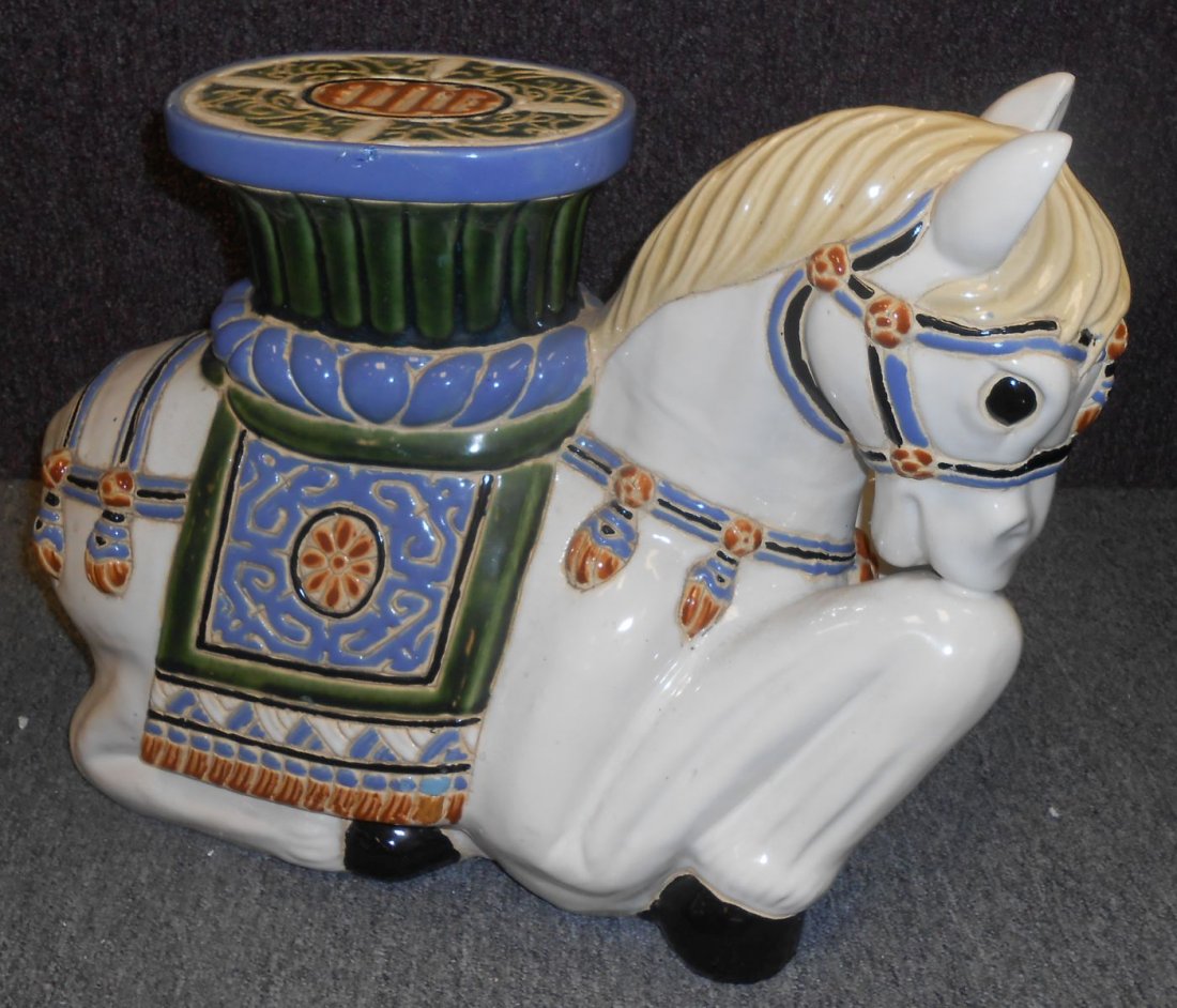 Ceramic Hollywood Regency Style Horse Garden Stool Seat: Vintage Mid-Century, Hollywood Regency Style Horse or Pony Ceramic Garden Stool Seat. Measures 16" tall x 20" wide x 9" deep. Overall condition is good. 1 small chip (see close up photo). Starting Bid