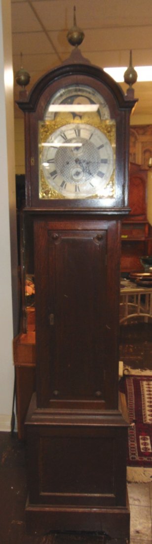Antique Grandfather Clock: Antique Grandfather Clock. Oak Case. Not Working. Measures 91" tall x 19" wide x 12" deep. Overall condition is fair to good with plenty of wear. Weights and Pendulum included. Several Shipping Option