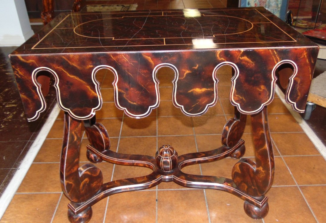 Faux Tortoise Shell Side Table Alfonso Marina: Faux Tortoise Shell Side Table by Alfonso Marina. Measures 27-1/2" tall x 31-1/2" wide x 19-1/2" deep. Overall condition is good with minor wear and surface scratches. Bottom is marked and Dated. Star