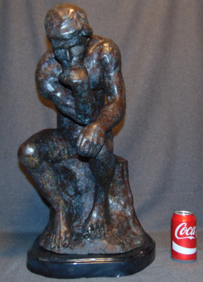 "The Thinker" Bronze Sculpture Auguste Rodin: "The Thinker" Bronze Sculpture on a Black Marble Base after Auguste Rodin (1840-1917). Measures 23" tall x 13" wide x 19" deep. Condition is New, Mint. No Damage. This Sculpture is made entirely from