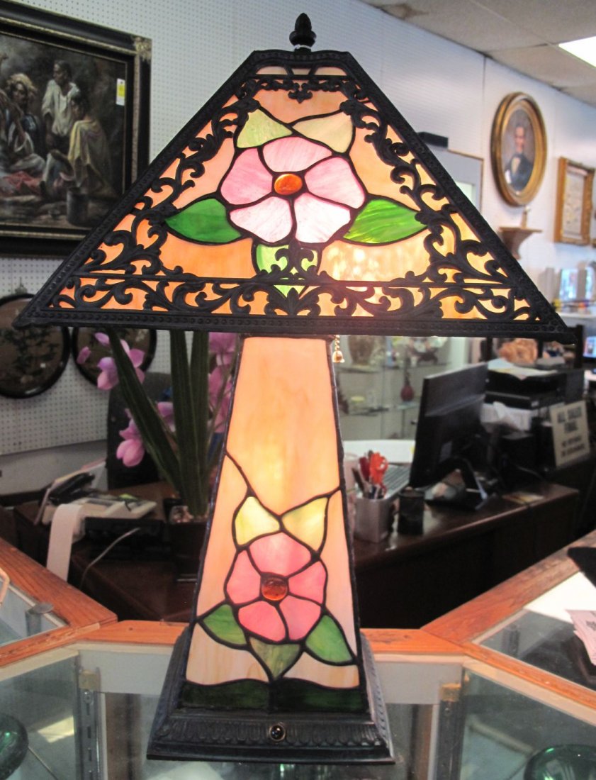 Stained Glass Table Lamp: Wonderful 4 sided Stained Glass Table Lamp. Beautiful Floral Pattern. Lights up Top, Bottom or Both. Measures 22" tall x 13" wide. Condition is Excellent. No damage. Several Shipping Options Available