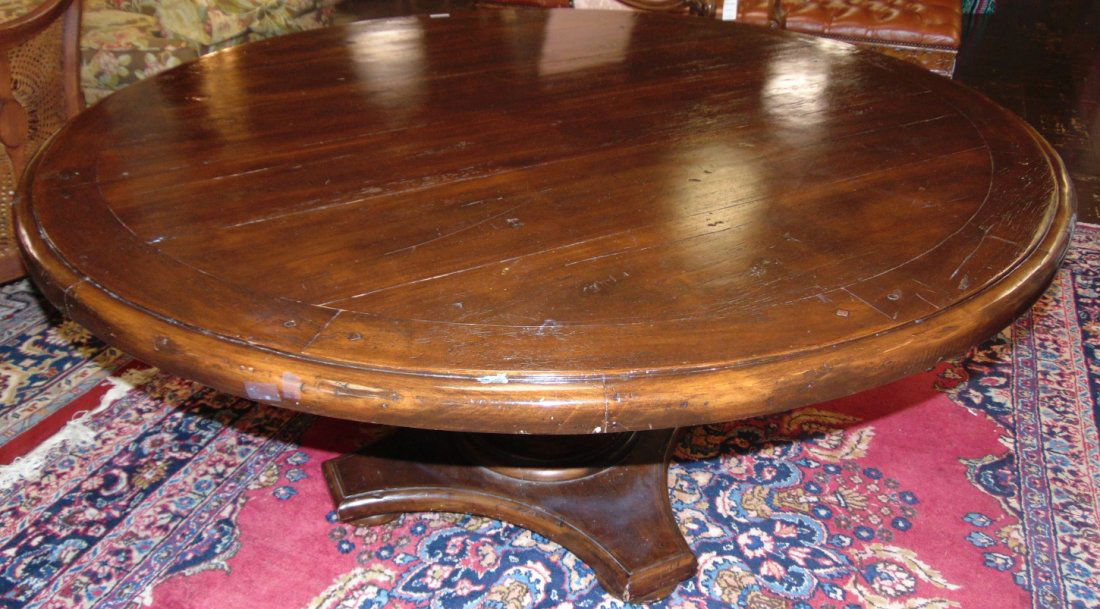Rustic Round Dining Table: Rustic Round Dining Table. Heavy. Measures 30" tall x 63" wide. Overall condition is good with minor wear. Several Shipping Options Available. Starting Bid $200. Auction Estimate $250 - $300.