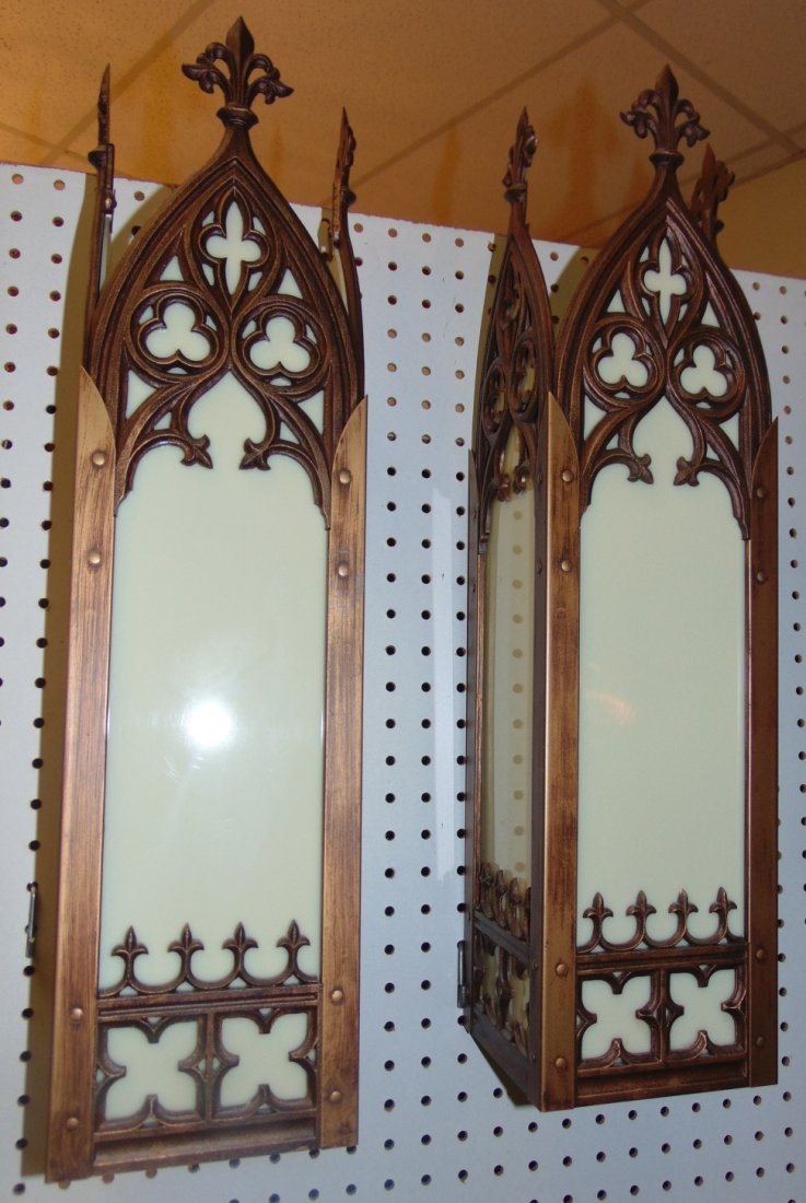 Pair (2) of Gothic Church Wall Sconces: Pair (2) of Gothic Church Wall Sconces. Brass and Glass. Measures 24" tall x 6" wide x 6" deep. Condition is good with minimal wear. No damage. 2 Bulbs. Working Condition. Several Shipping Options Ava