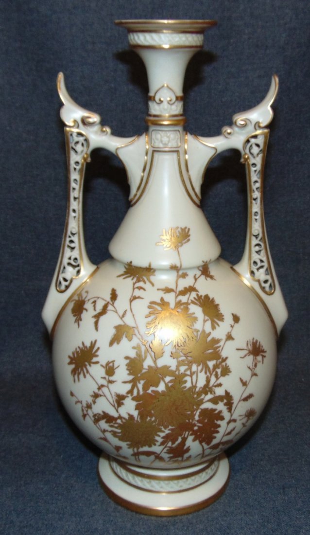 Ivory Royal Worcester 2 Handled Vase: Ivory Royal Worcester 2 Handled Vase. Shape 1071, date code c.1888. Bottom is signed. Measures 14" tall x 7-1/2" wide. Overall condition is Excellent. No Damage. Bottom Drilled for lamp.