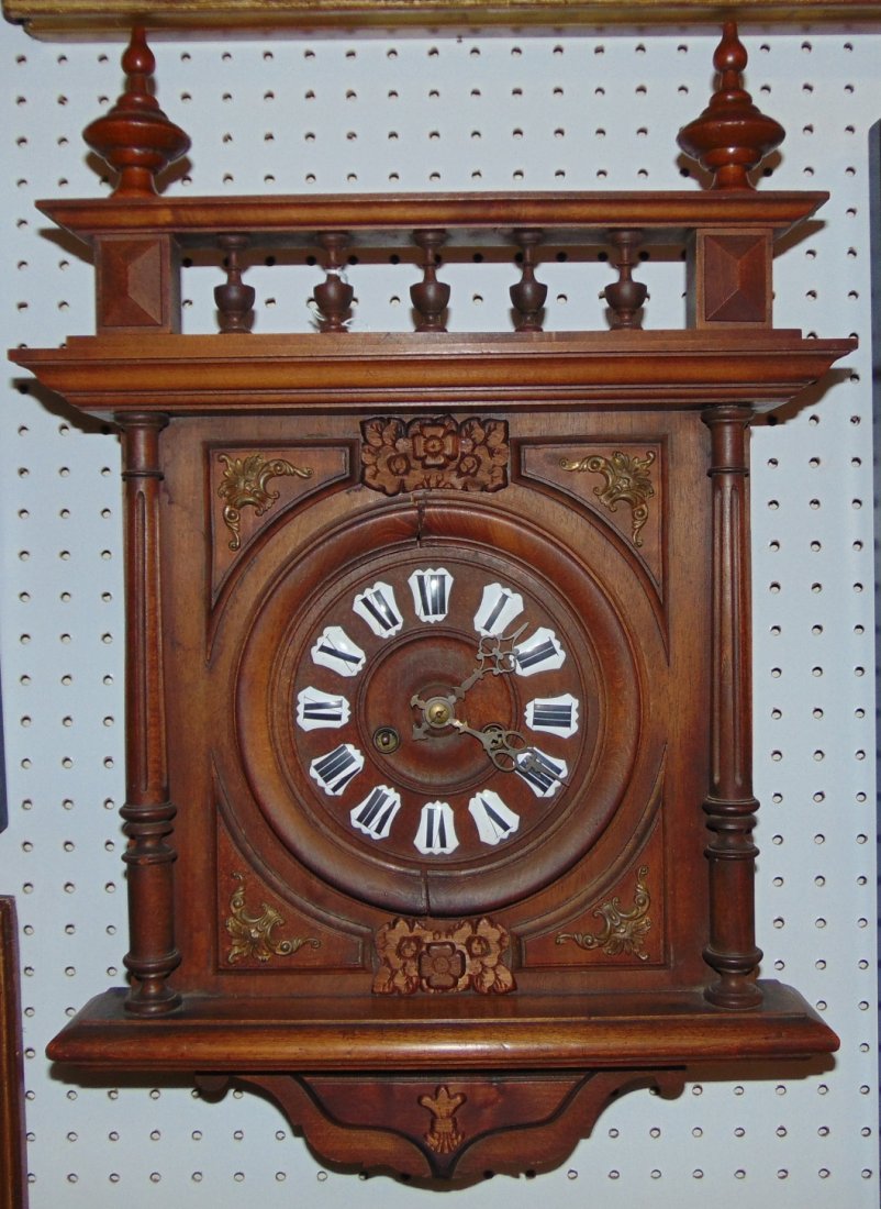 Antique German Wall Clock: Antique German Wall Clock. Measures 24" tall x 15-1/2" wide. Condition is good with minimal wear. Cracks in some moulding (see close up photos). All Clocks are Sold as is. Several Shipping Options Ava