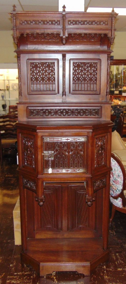 Antique Gothic Mahogany Tall Cabinet: Antique Gothic Mahogany Tall Cabinet. Circa 1900. Measures 93" tall x 36" wide x 18" deep. Overall condition is good. Middle drawer & some moulding missing. Wear consistent with age and use. Several S