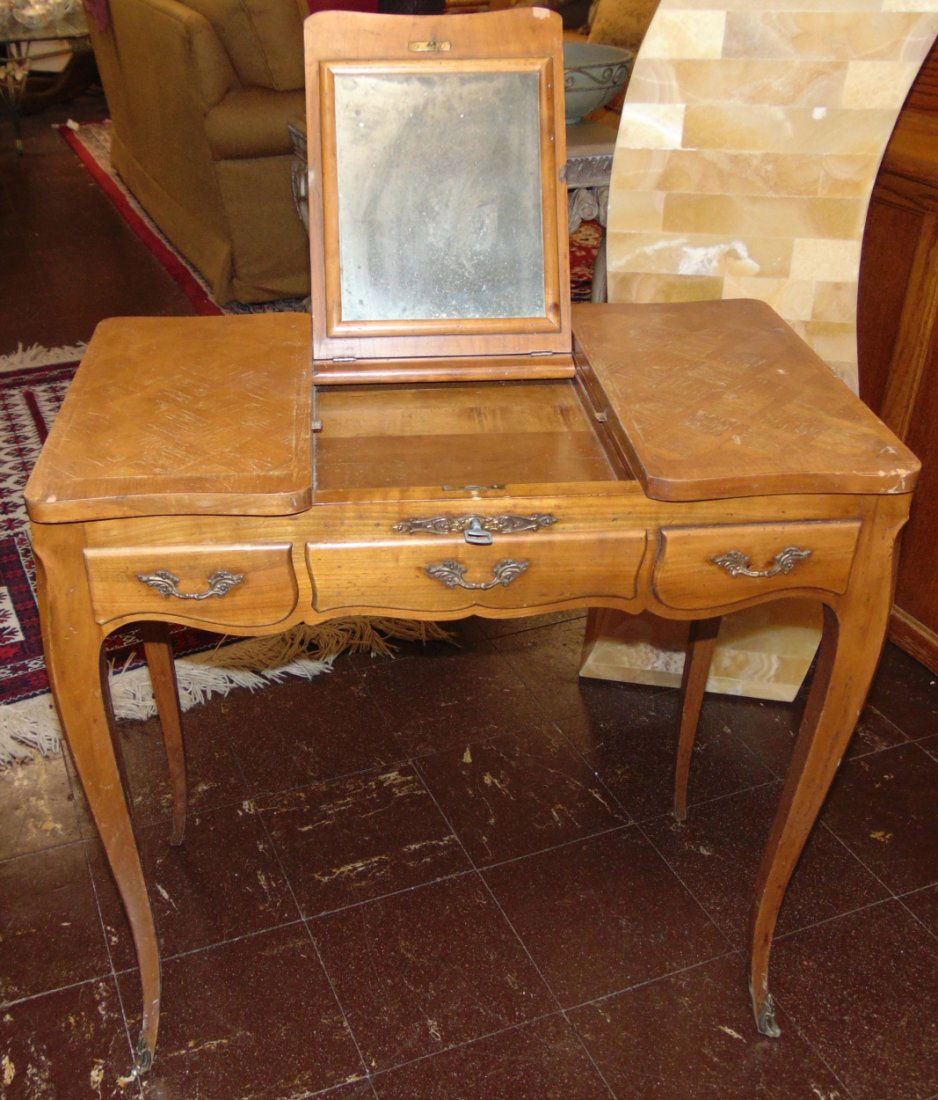 Petit Antique French Vanity Dressing Table: Petit French Style Vanity Dressing Table with Mirror. Measures 27-1/2" tall x 27-1/2" wide x 13" deep. Overall condition is good with minor wear. Several Shipping Options Available.
