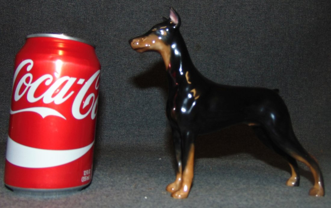 Royal Doulton Champion Rancho Dobe's Storm Doberman: Royal Doulton Champion Rancho Dobe's Storm Doberman Pinscher Dog Figurine. HN 2645. Measures 6" tall x 7" wide. Bottom is marked. Overall condition is Excellent. No Damage. Several Shipping Options Av