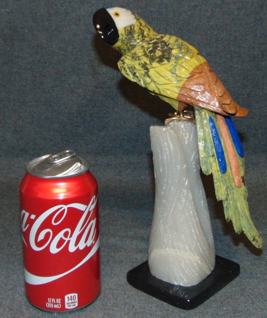 Hand Carved Semi-Precious Stone Macaw Sculpture: Hand Carved Semi-Precious Stone Macaw or Parrot Sculpture. Beautifully carved with semi precious stones on its tail and multi colored jaspers. Measures 10" tall x 3-1/2" wide. Condition is Excellent. 