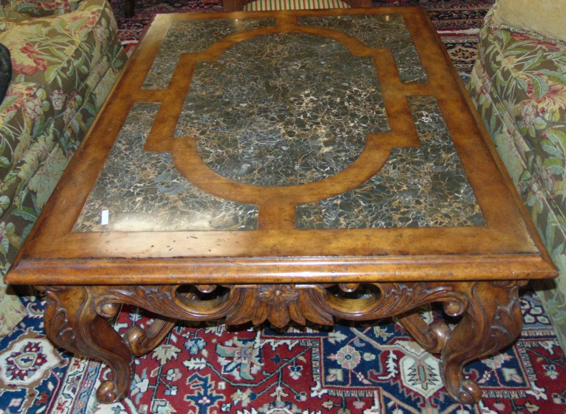 Maitland-Smith Marble Inlaid Coffee Table: Beautiful Maitland-Smith Marble Carved Wood and Inlaid Coffee Table. Measures 22" tall x 52-1/2" wide x 40-1/2" deep. Condition is very good. No Damage. Several Shipping Options Available. Starting Bi