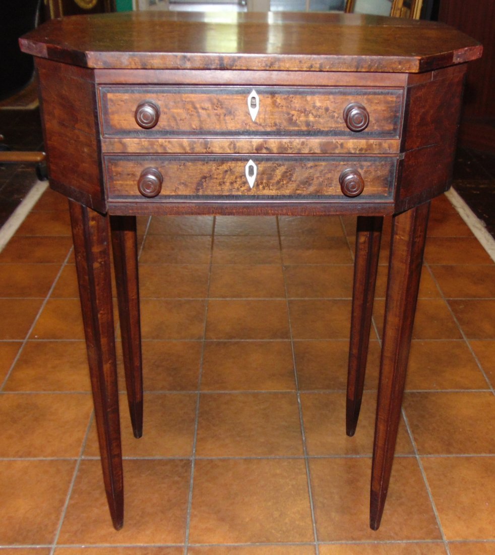 Antique Maple Sewing Table: Antique 2 Drawer Maple Sewing Table. Circa 19th century. Measures 29" tall x 21" wide x 15" deep. Overall condition is good to fair. Wear consistent with age and use. Separation crack along surface (s