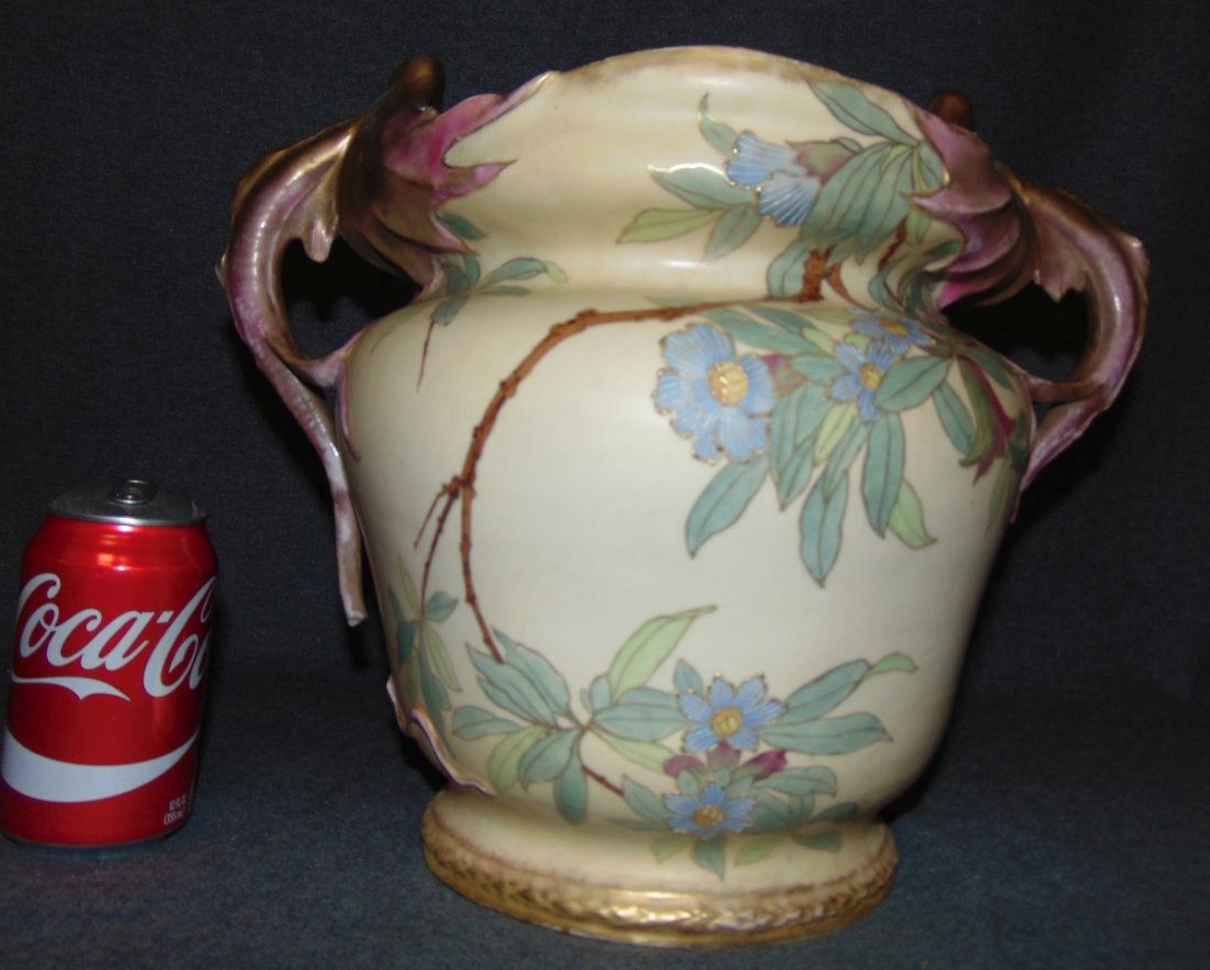 Teplitz Amphora Vase: Large and beautiful Teplitz Amphora Vase. Measures 12-1/4" tall x 10-1/2" wide. Overall condition is good to fair. Some losses to handles. Bottom is properly marked. Several Shipping Options Available