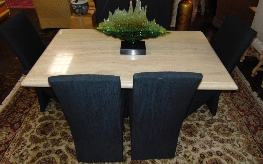 Heavy Travertine Dining Table with 6 Chairs: Heavy Travertine Marble Stone Dining Table With Travertine Base & 6 Upholstered Chairs. 2 Captains Arm Chairs and 4 Side Chairs. Measures 30" tall x 70" wide x 41" deep. Overall condition is Excellent