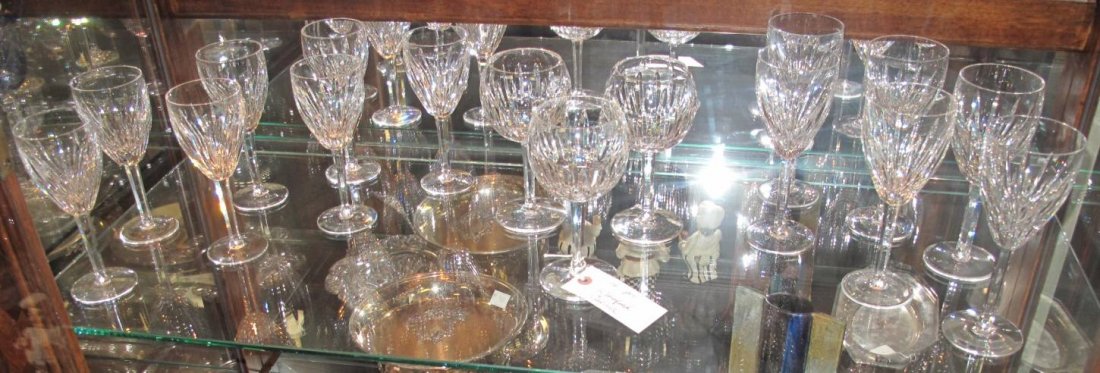 Lot of 16 Waterford "Carina" Wine Glasses: Lot of 16 Waterford "Carina" Glasses. Includes: 7 Wine, 6 Water and 3 Balloon Wine Glasses. Overall condition is good. One wine has small chip. Several Shipping Options Available. Starting Bid $80.