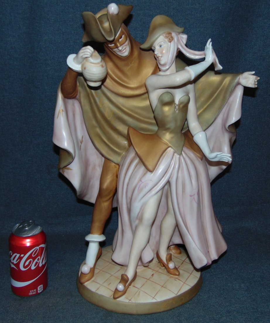 19th Century Royal Dux Figure Masquerade Couple: Large, 19th Century Royal Dux Porcelain Figure of a Masquerade Couple Dancing. Measures 20" tall x 14" wide. Condition is good. Some Crazing. Bottom is marked. Several Shipping Options Available. Star