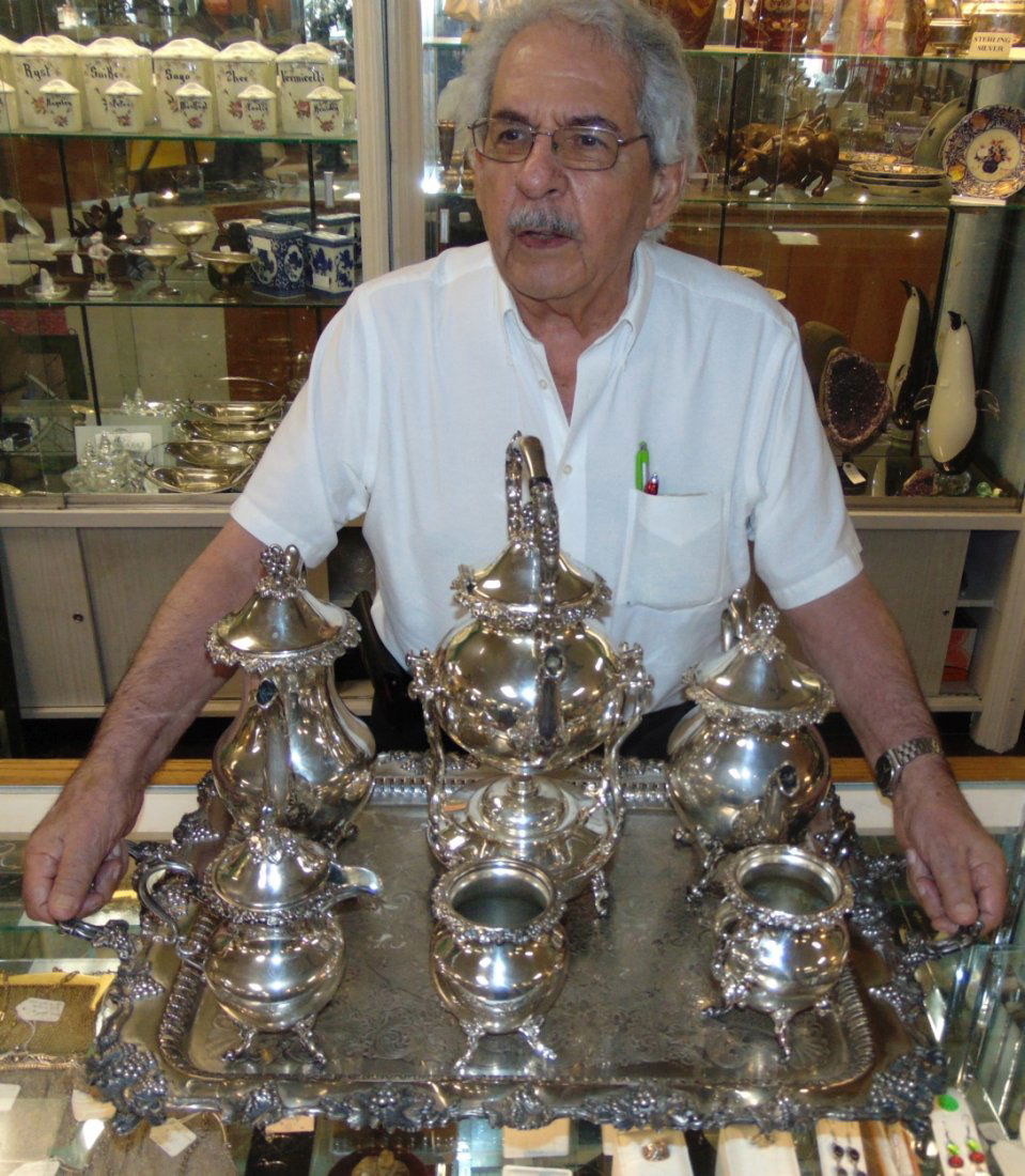 Magnificent Silver Plated Tea & Coffee Set: Magnificent and Large English Silver Plated Tea & Coffee Set with Tray. Set consists or Coffee Pot, Tea Pot, Hot Water Pot on Tilt stand, Cream, Sugar and Waste Bowl. Beautiful, 2 Handled Tray include