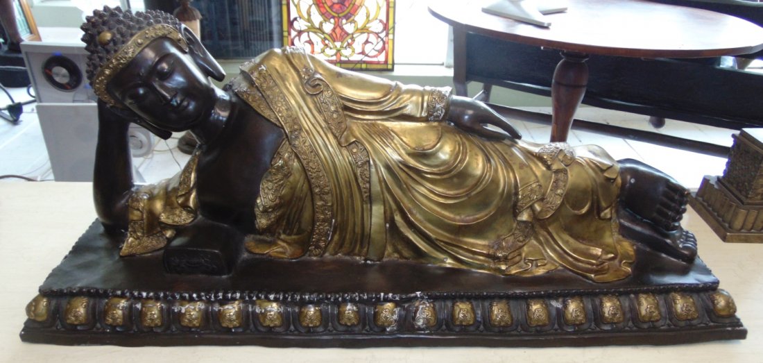 Bronze Reclining Buddha Sculpture: Large Bronze Reclining Buddha Sculpture. High Quality Bronze with excellent Detail and patina. Cast and crafted one piece at a time in the traditional lost wax method. Bronze may be used indoor or out
