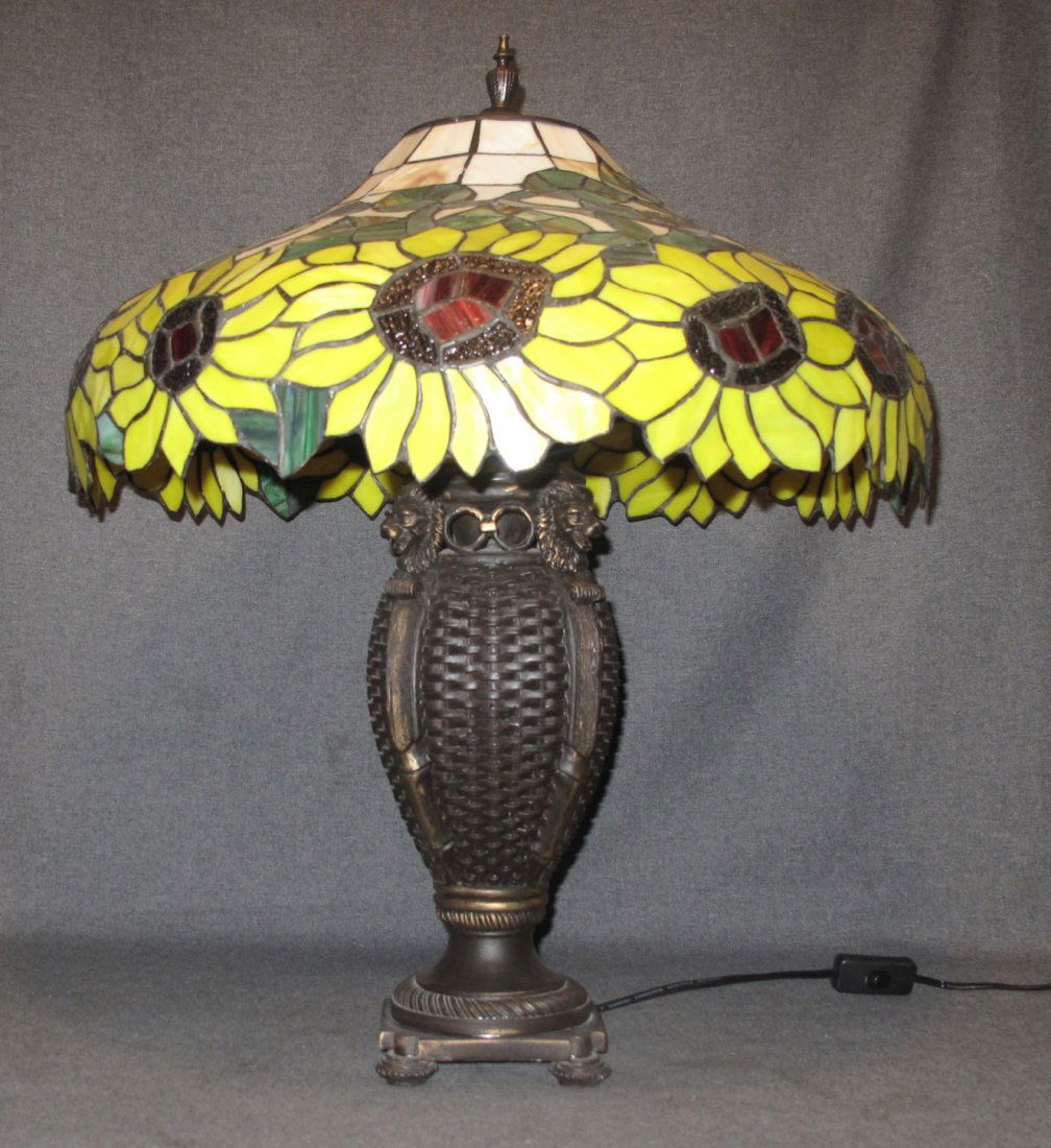 Stained Glass Table Lamp with Sunflowers: Stained Glass Table Lamp with Sunflowers. Measures 25" tall x 22" wide. Overall condition is Excellent. No damage. Starting Bid $50.