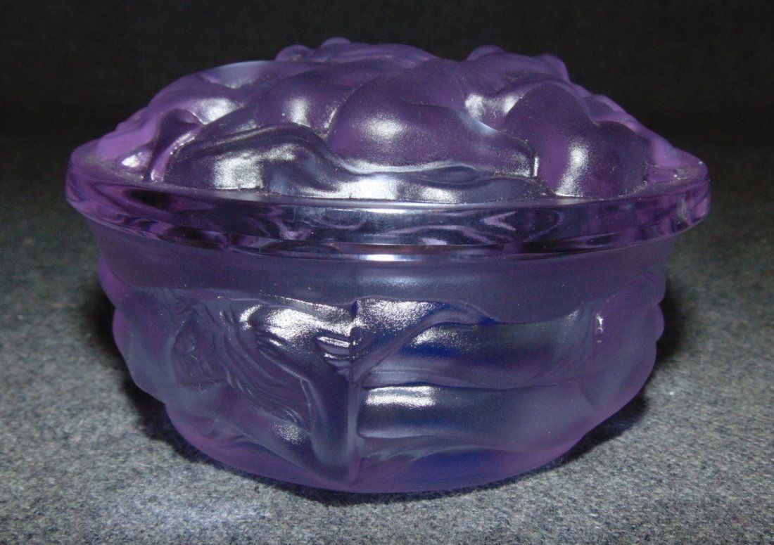Czech Bohemian Alexandrite Glass Jar: Czech Bohemian Alexandrite Glass Lidded Vanity Jar. Measures 2-1/2" tall x 3-3/4" wide. Includes original silk lined gift box. Condition is Like New. Very good. No Damage. Starting Bid $20.