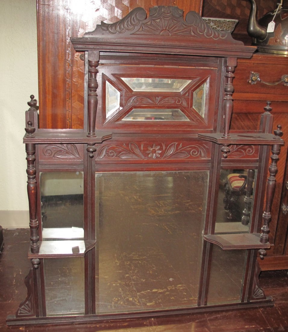 Antique Victorian Mirror: Antique Victorian Mirror. Measures 44" tall x 41-1/2" wide. Overall condition is good. No damage. Starting Bid $30.