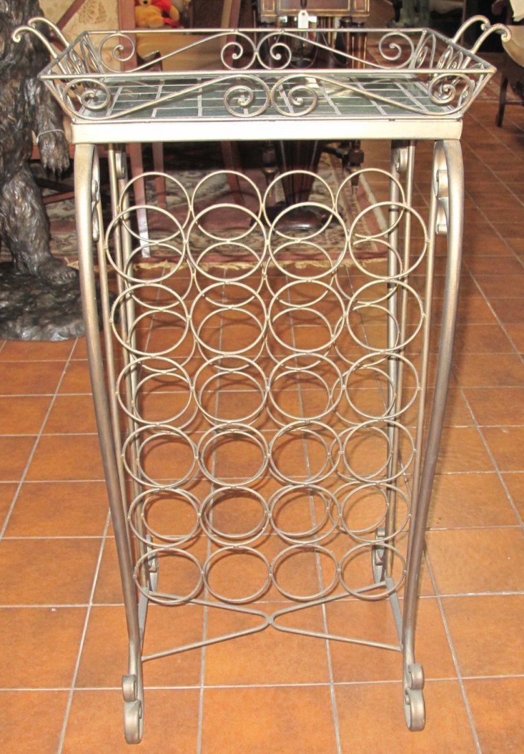 Wine Rack Side Table: Iron Wire and Tile, Wine Rack Side Table with Removable Tray Top. Base holds 24 Bottles. Measures 38-1/2" tall x 23" wide x 14-1/2" deep. Condition is good. No damage.