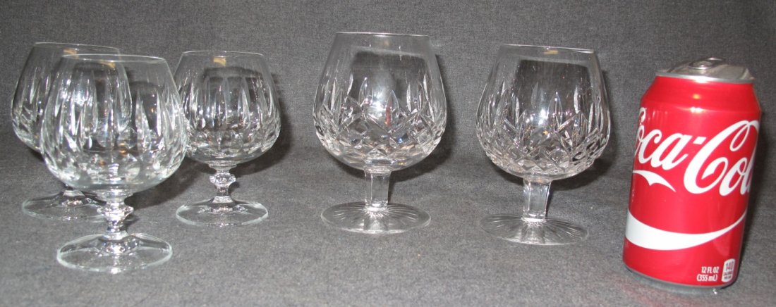 5 Waterford Crystal Lismore Glasses: 5 Waterford Crystal Lismore Glasses. 2 are 5" tall Brandy Snifters and 3 smaller 4-1/2" Snifters. Condition of all is Excellent. Mint. No damage. Bottoms are marked.