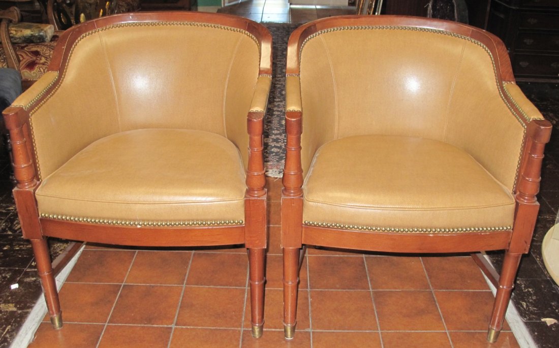 Set of 2 Leather Arm Chairs: Set of 2 Leather Arm Chairs. Slightly used condition. No rips or tears. Arm Chairs measures 33" tall x 25" wide x 25" deep. Starting Bid $70.
