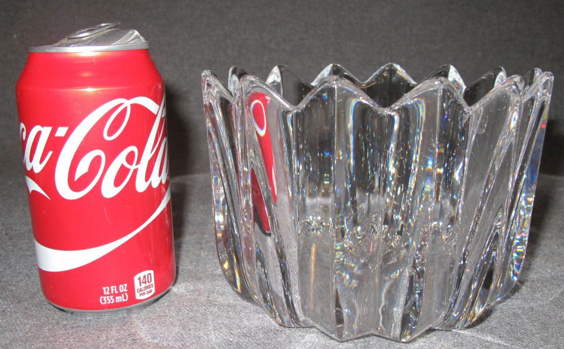 Orrefors "Fleur" Crystal Bowl: Orrefors "Fleur" Crystal Bowl. Measures 4-1/2" tall x 6-1/4" wide. Condition is Very good. No damage. Bottom is marked. Starting Bid $40.