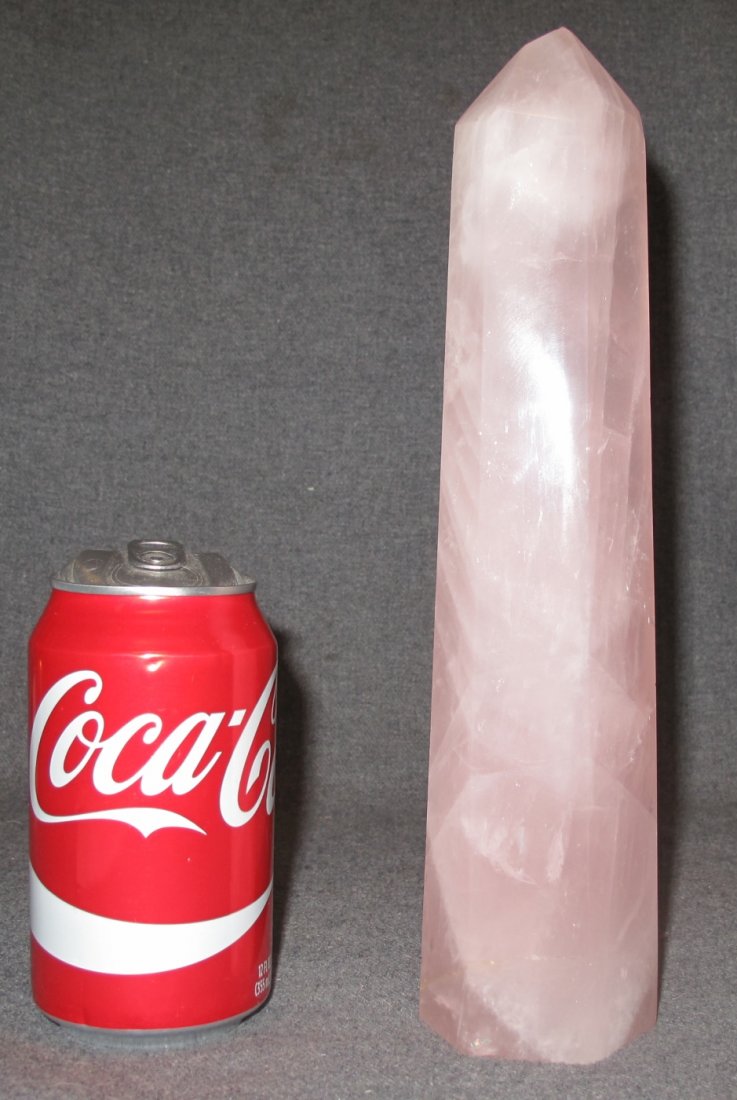 Polished Rose Quartz Point or Obelisk: Polished Rose Quartz Point or Obelisk. Measures 11" tall x 3" wide. Condition is Very good. No damage.