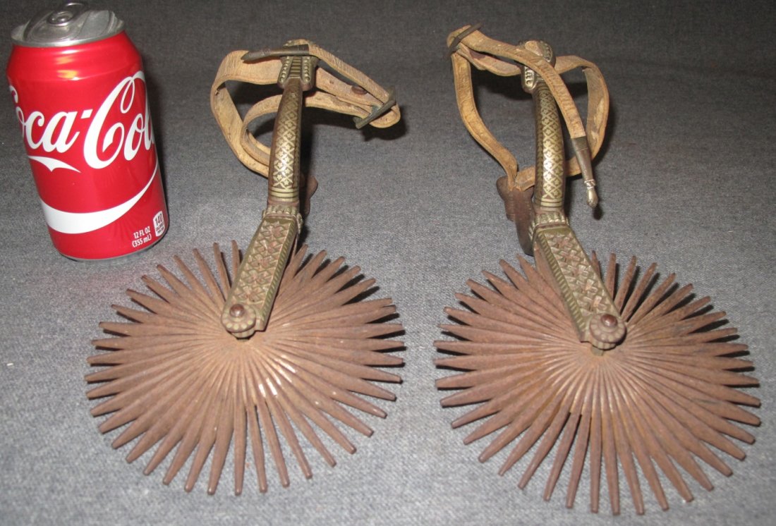 VINTAGE PAIR of GAUCHO DANCE SPURS: Vintage Pair of Gaucho Dance Spurs. Each measures 10" x 5-1/2" . Condition is good. No damage. Starting Bid $100.