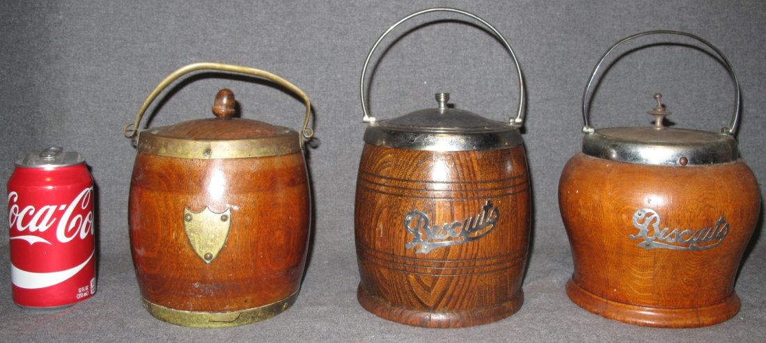 3 VINTAGE WOOD BISCUIT JARS: 3 Vintage Wooden Biscuit Jars. Each measures 7" tall. Condition is good to fair. Some Wear. Starting Bid $50.