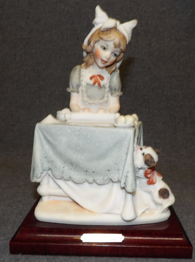 GIUSEPPE ARMANI GIRL BAKING with KITTY: Giuseppe Armani "Girl Baking with Kitty" Sculpture. Issued 1986. Signed. Measures 8" tall. Condition is Excellent. Mint. No damage. Starting Bid $30. Auction Estimate $40 - $60.