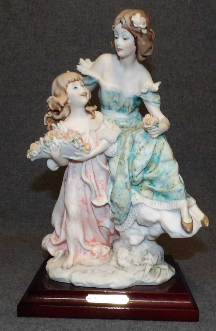GIUSEPPE ARMANI LADY with GIRL: Giuseppe Armani "Lady with Girl" Sculpture, #954C. Issued 1987. Signed. Measures 10" tall. Condition is Excellent. Mint. No damage. Starting Bid $30. Auction Estimate $50 - $60.
