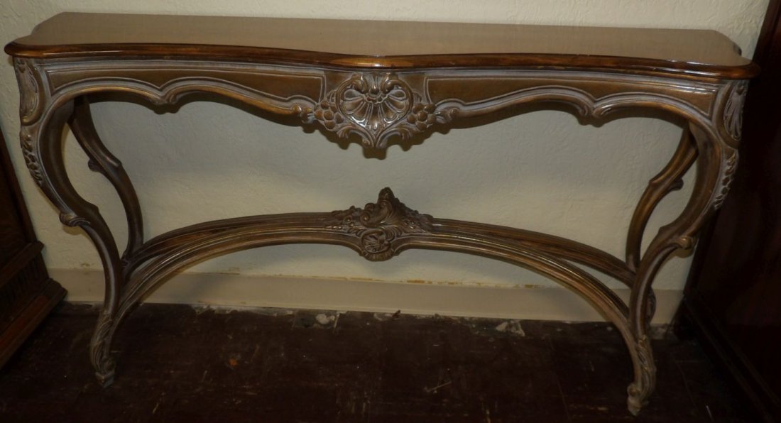 CARVED WOOD FRENCH STYLE CONSOLE TABLE: Carved Wood French Style Console Table. Measures 32" tall x 59" wide x 15" deep. Condition is very good. No damage. Starting Bid $100. Auction Estimate $250 - $500.