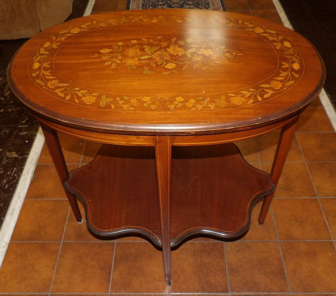 INLAID MAHOGANY SIDE TIER TABLE: Vintage Inlaid Mahogany Side Tier Table. Measures 29" tall x 31" wide x 22" deep. Overall condition is very good. No damage. Starting Bid $40. Auction Estimate $150 - $200.
