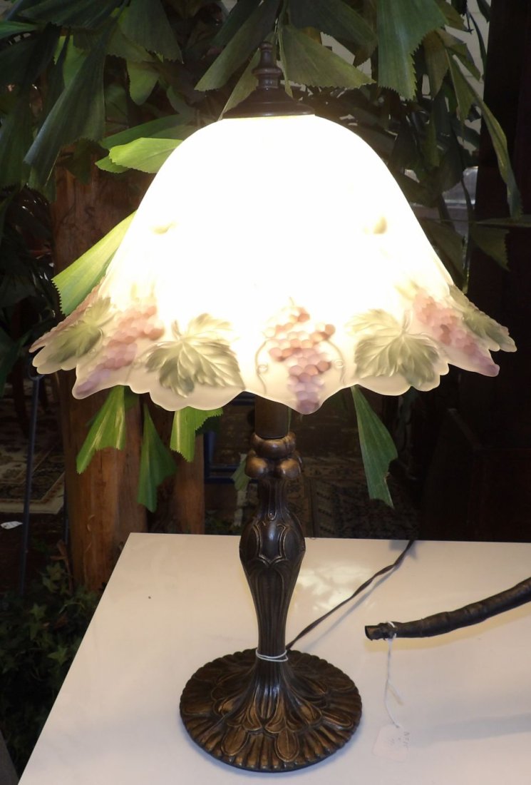 PAIR OF FROSTED GLASS TABLE LAMPS: Pair of Frosted Glass Table Lamps. Each measure 21" tall x 14" wide. Condition is very good. No damage. Starting Bid $60. Auction Estimate $100 - $200.